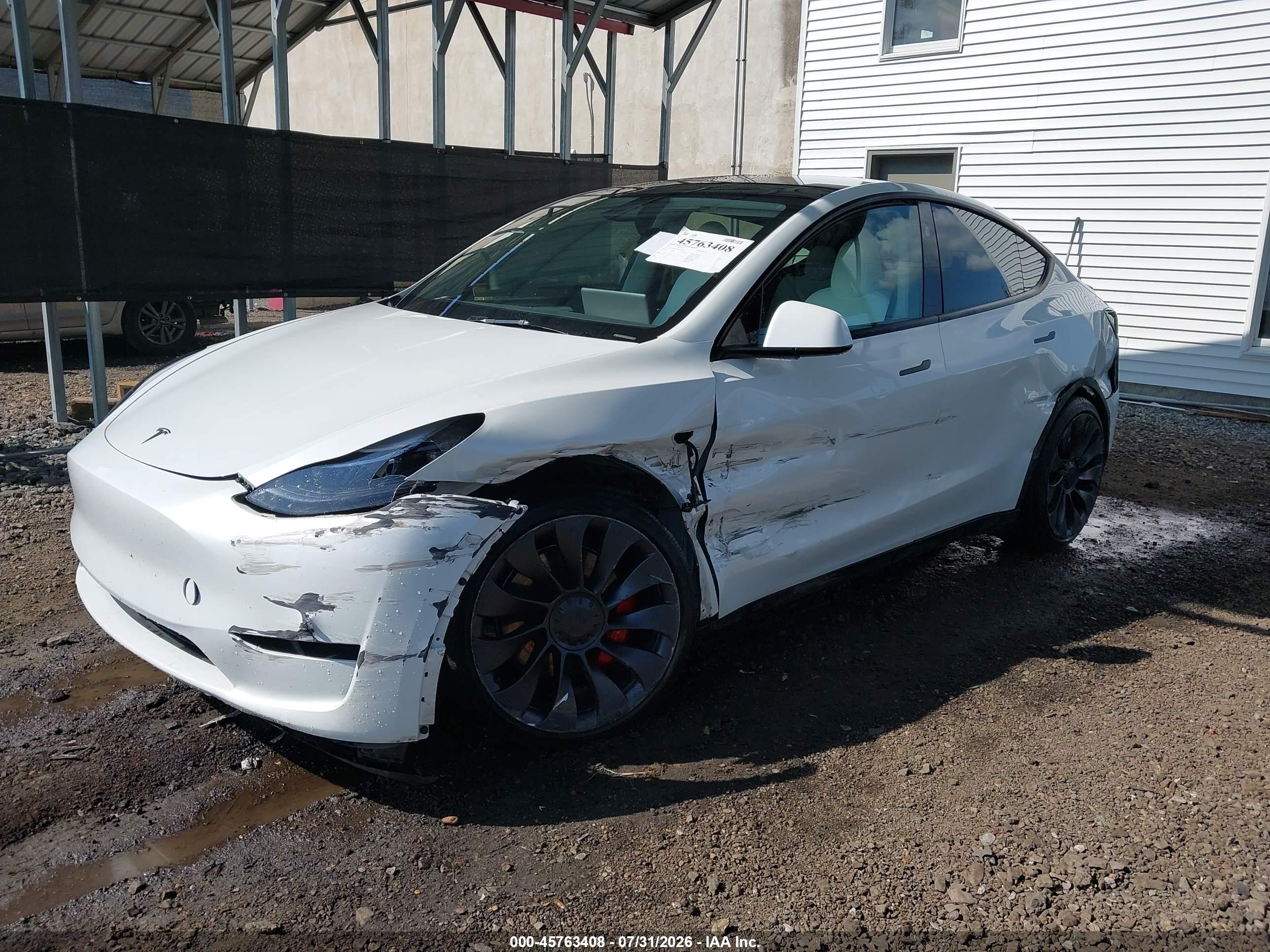 2025 TESLA MODEL Y — I2