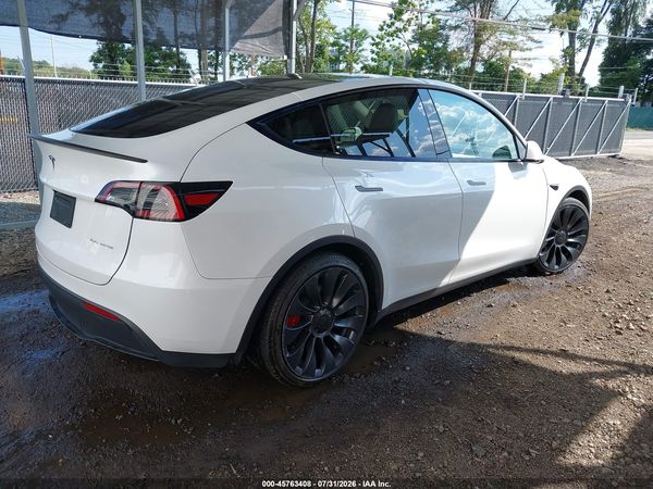 2025 TESLA MODEL Y — I4