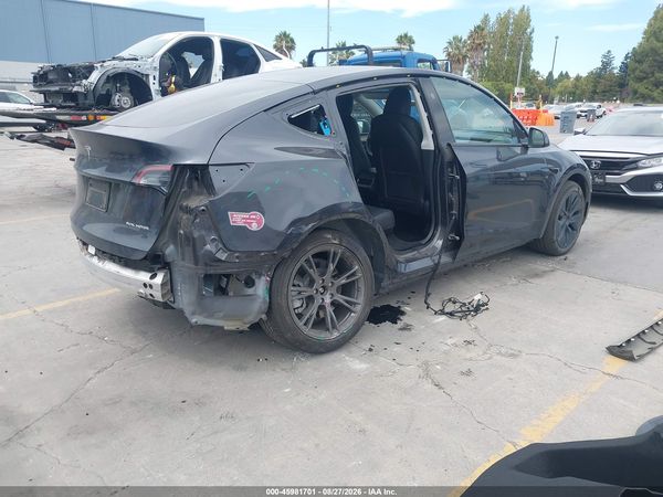 2025 TESLA MODEL Y — I4