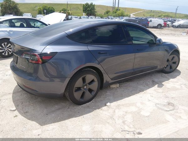 2023 TESLA MODEL 3 — I4