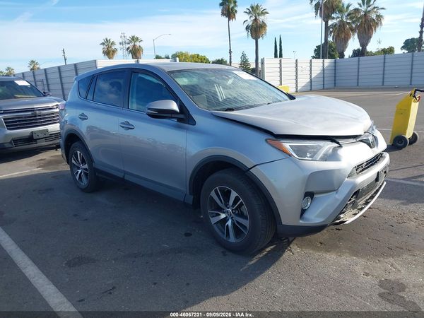 2018 TOYOTA RAV4 XLE — I1