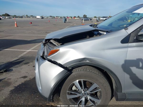 2018 TOYOTA RAV4 XLE — I86