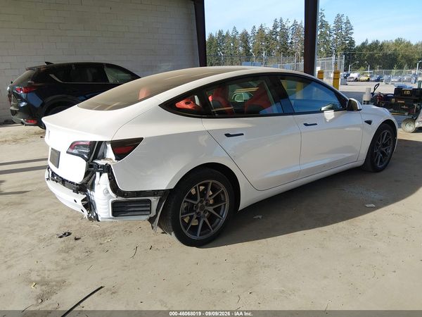 2023 TESLA MODEL 3 — I4