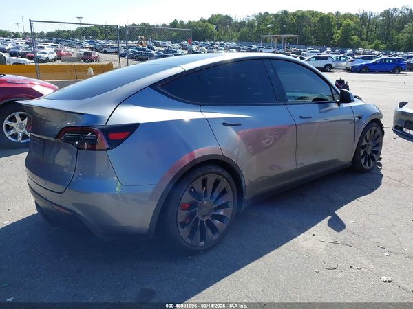 2025 TESLA MODEL Y — I4