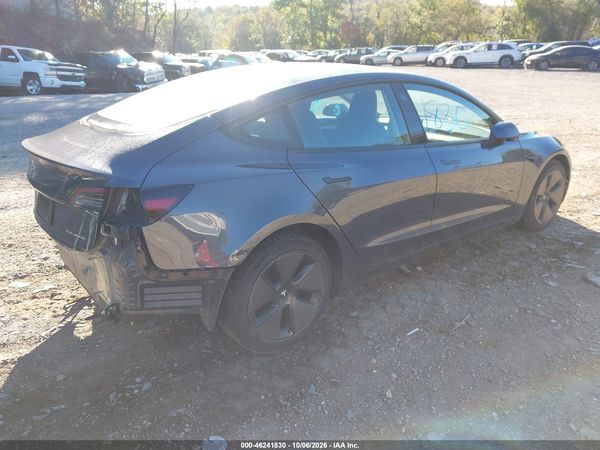 2023 TESLA MODEL 3 — I4