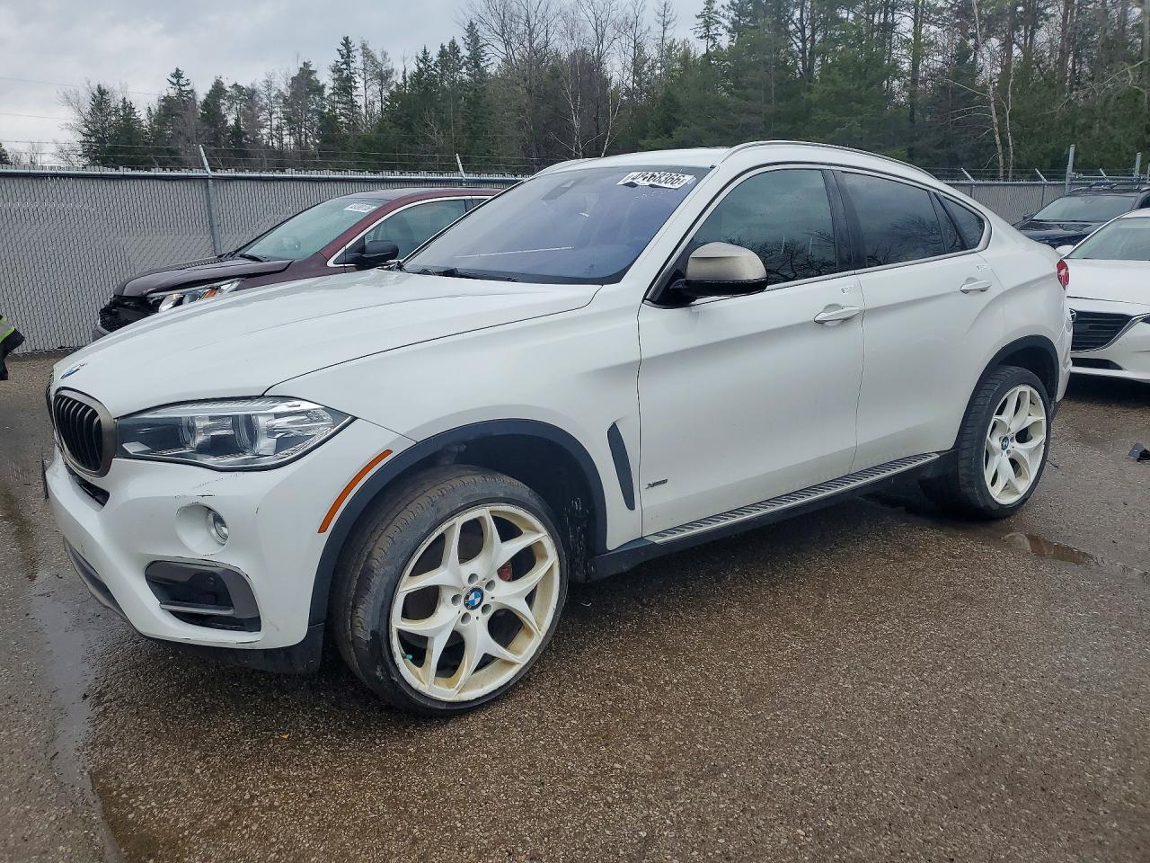 2016 BMW X6 xDrive35i — Front 3/4