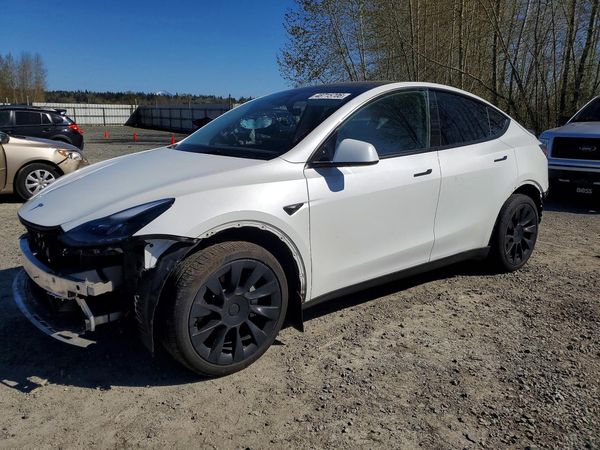 2024 TESLA MODEL Y — Front 3/4