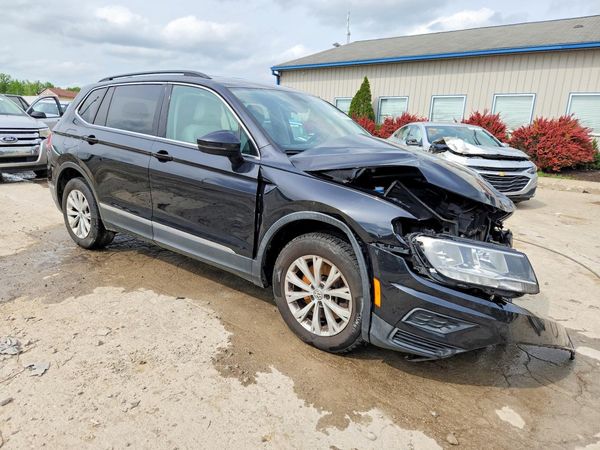 2018 VOLKSWAGEN TIGUAN SE, SEL — Passenger 3/4