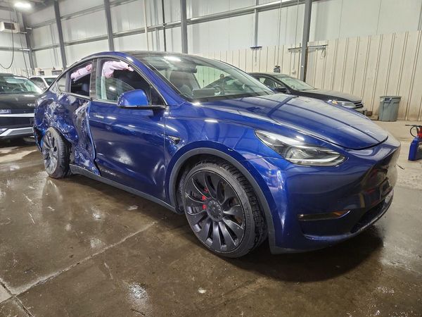 2023 TESLA MODEL Y — Passenger 3/4