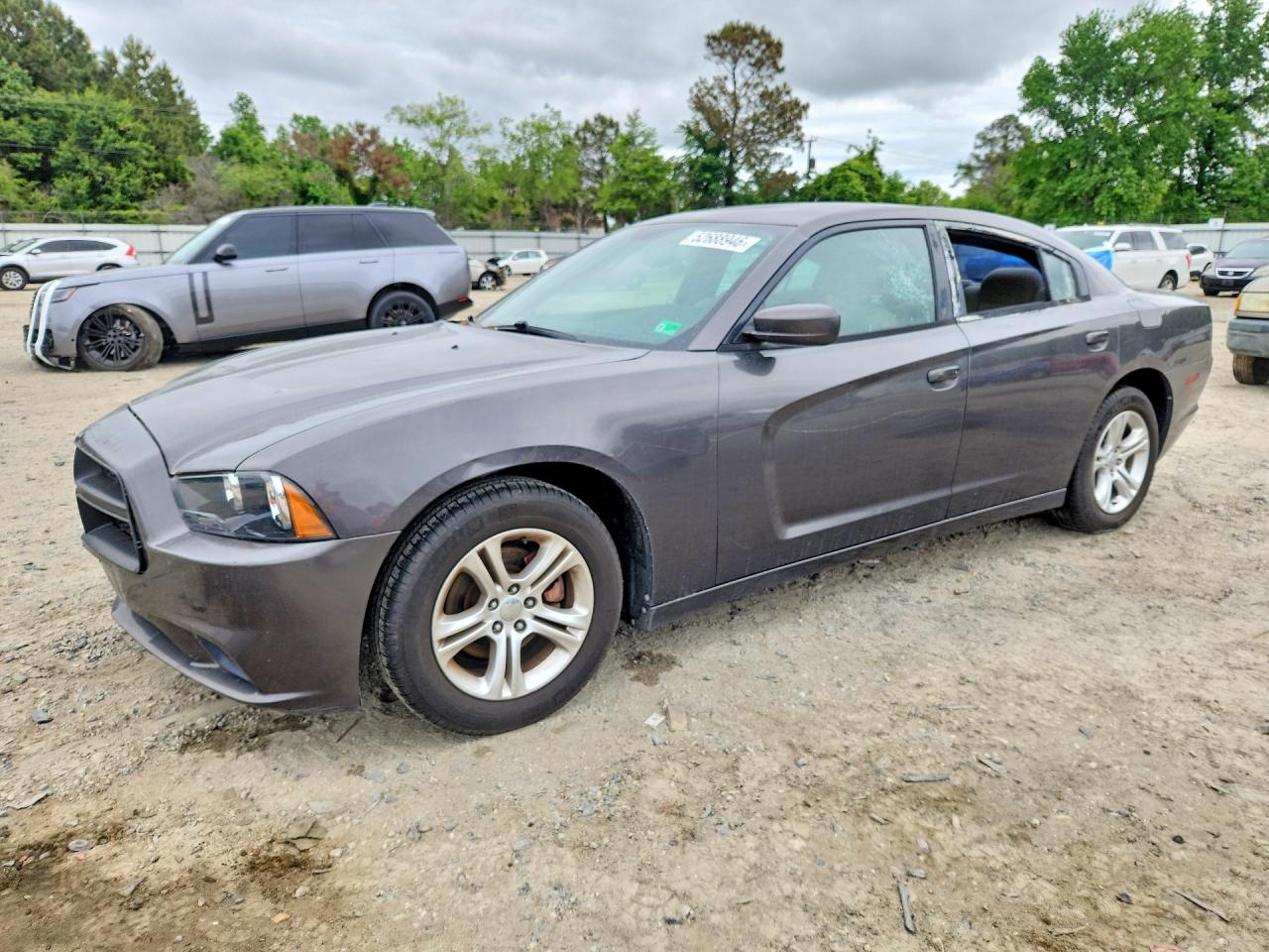 2014 DODGE CHARGER SE — Front 3/4