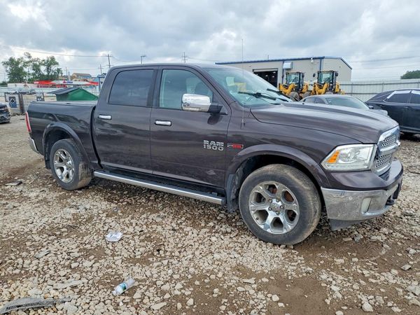2016 RAM 1500 Laramie — Passenger 3/4