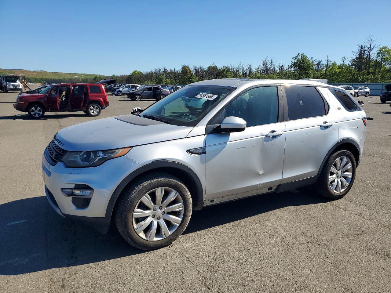 2015 LAND ROVER DISCOVERY HSE LUX — Front 3/4