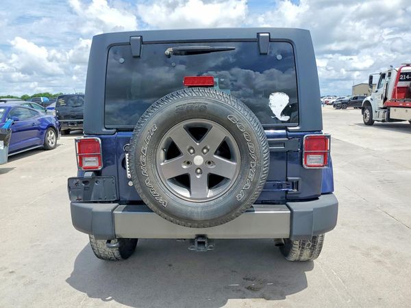 2013 JEEP WRANGLER Sport — DIRR