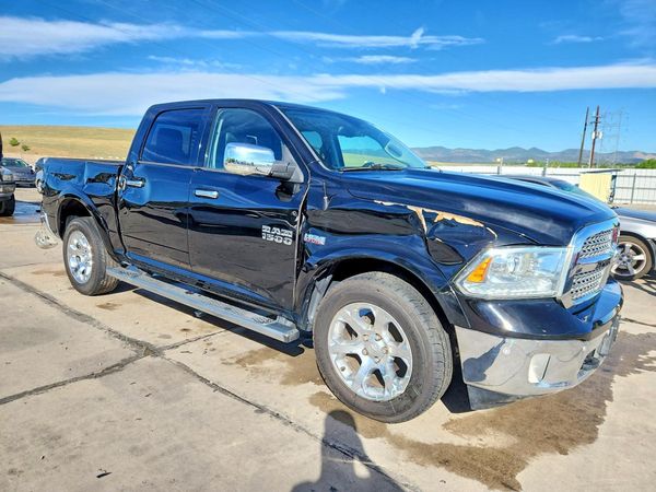 2014 RAM 1500 Laramie — Passenger 3/4