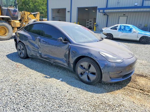 2023 TESLA MODEL 3 — Passenger 3/4