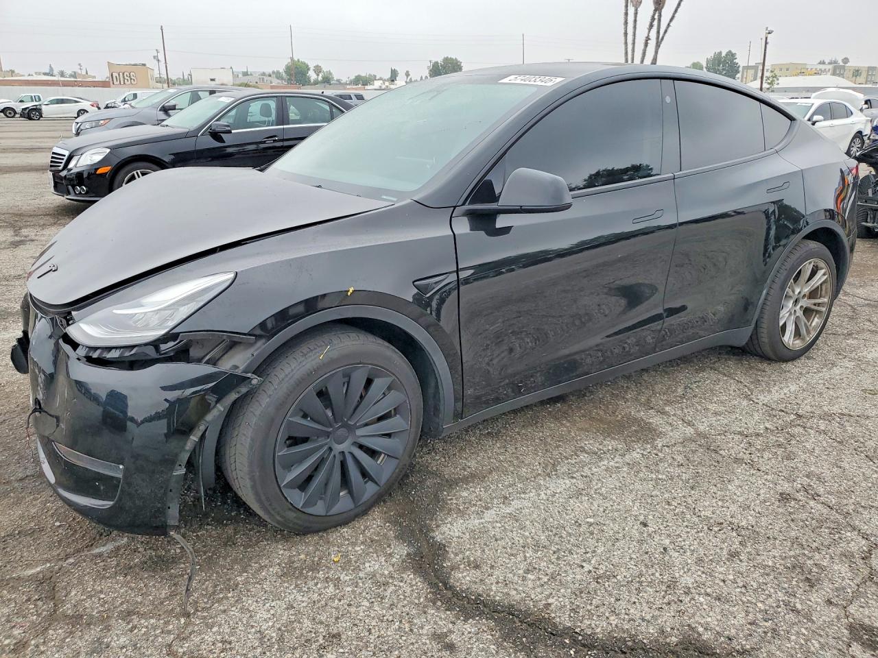 2023 TESLA MODEL Y — Front 3/4