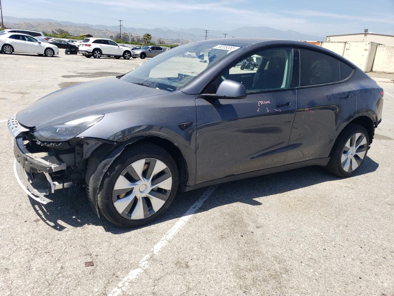 2023 TESLA MODEL Y — Front 3/4