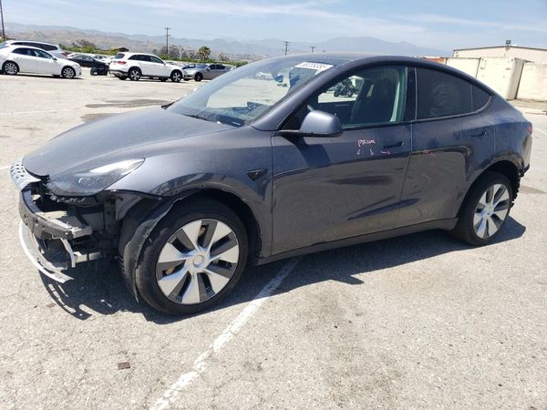 2023 TESLA MODEL Y — Front 3/4