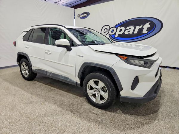 2019 TOYOTA RAV4 LE HV 4WD — Passenger 3/4