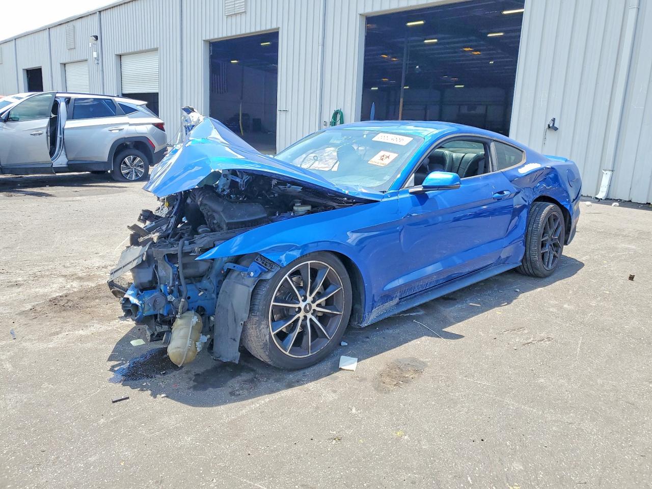 2017 FORD MUSTANG I4 Coupe — Front 3/4
