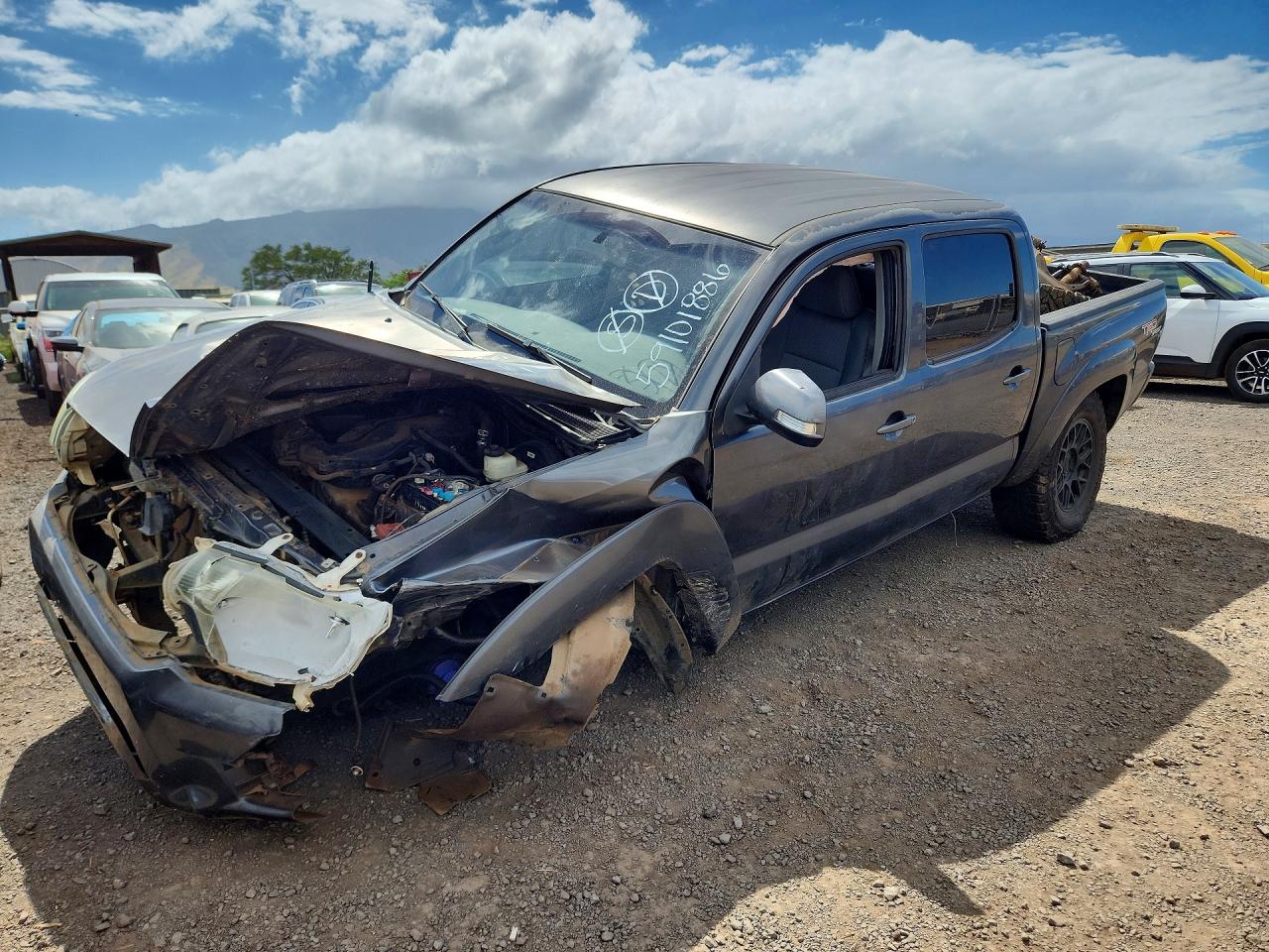 2013 TOYOTA TACOMA Delux — Front 3/4