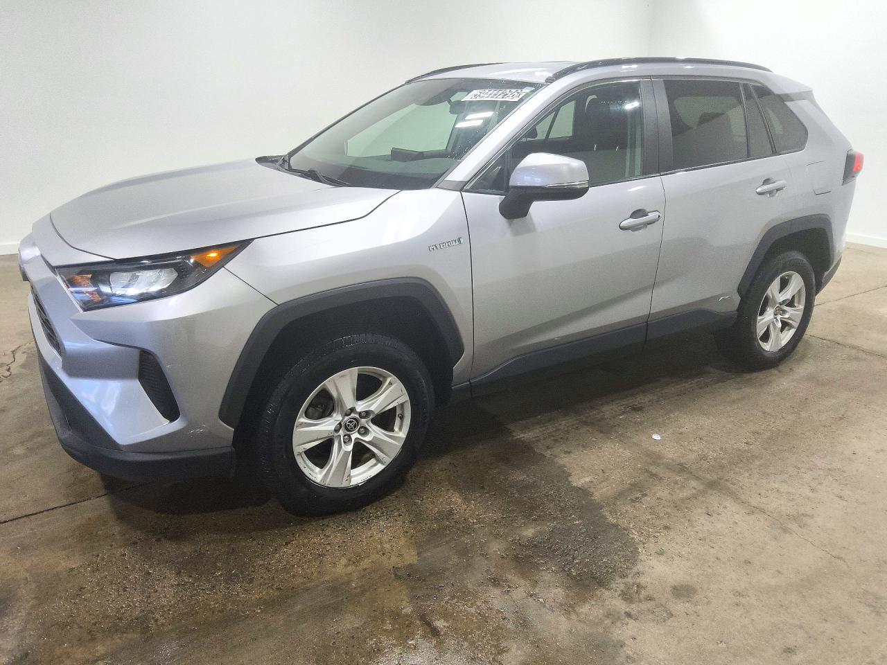 2021 TOYOTA RAV4 LE HV — Front 3/4