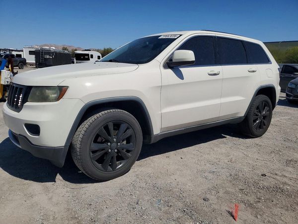 2012 JEEP CHEROKEE Laredo — Front 3/4