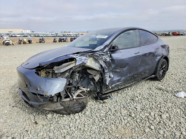 2023 TESLA MODEL Y — Front 3/4