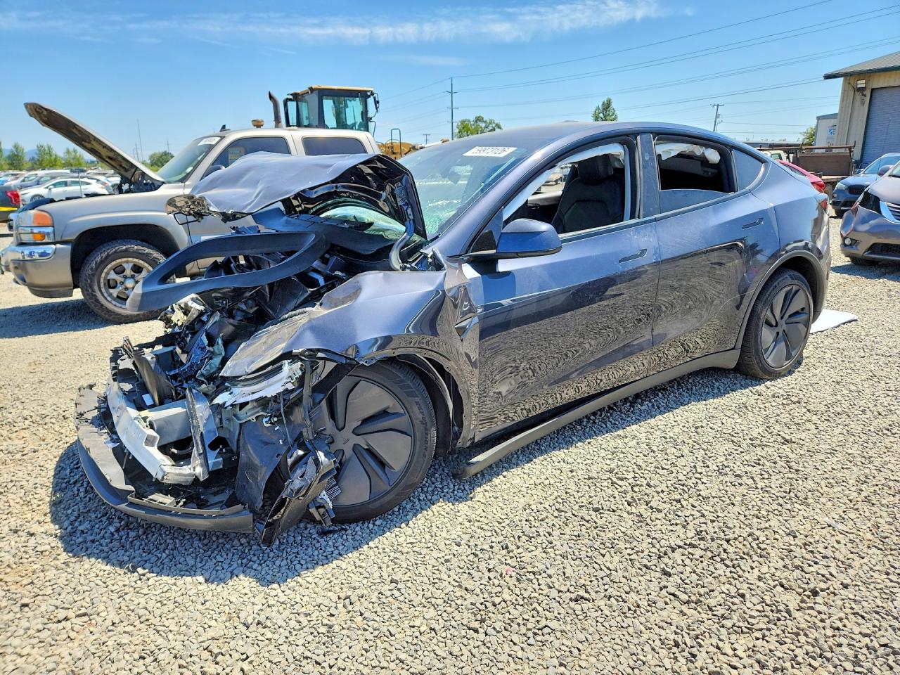 2026 TESLA MODEL Y — Front 3/4