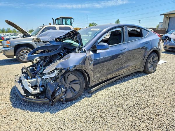 2026 TESLA MODEL Y — Front 3/4