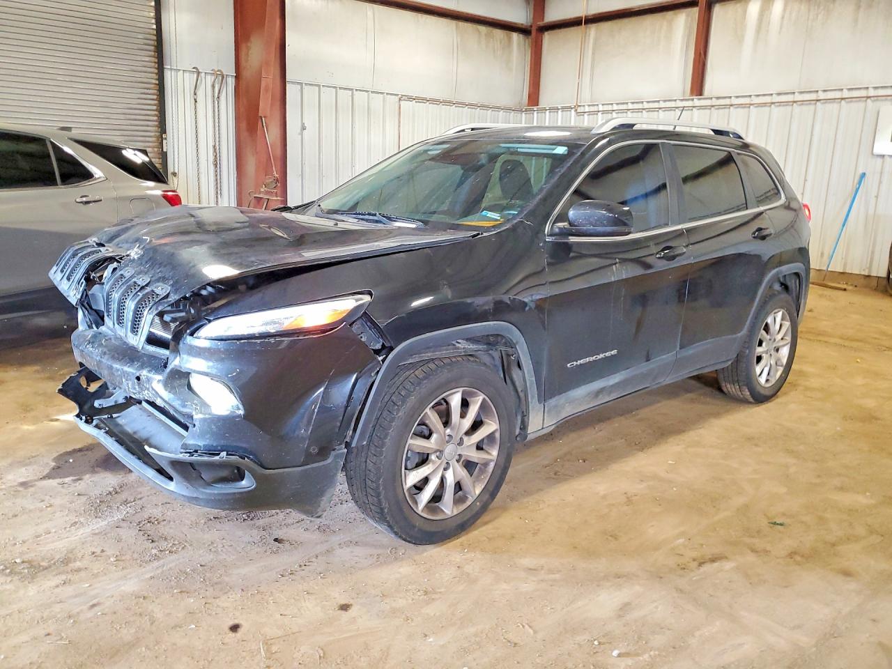 2014 JEEP CHEROKEE Limited — Front 3/4