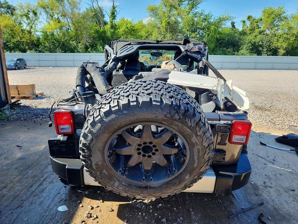 2014 JEEP WRANGLER Sahara — DIRR