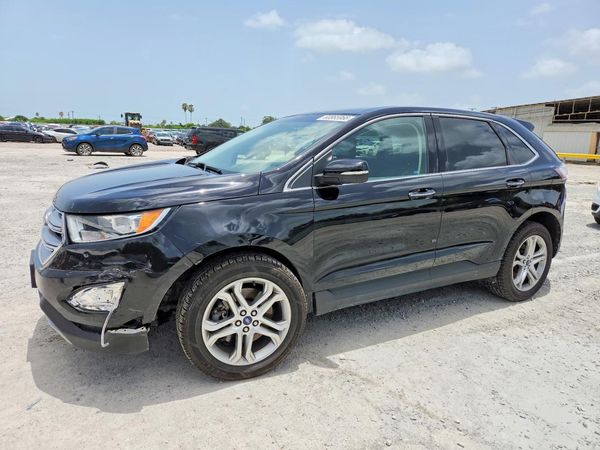 2017 FORD EDGE Titanium — Front 3/4