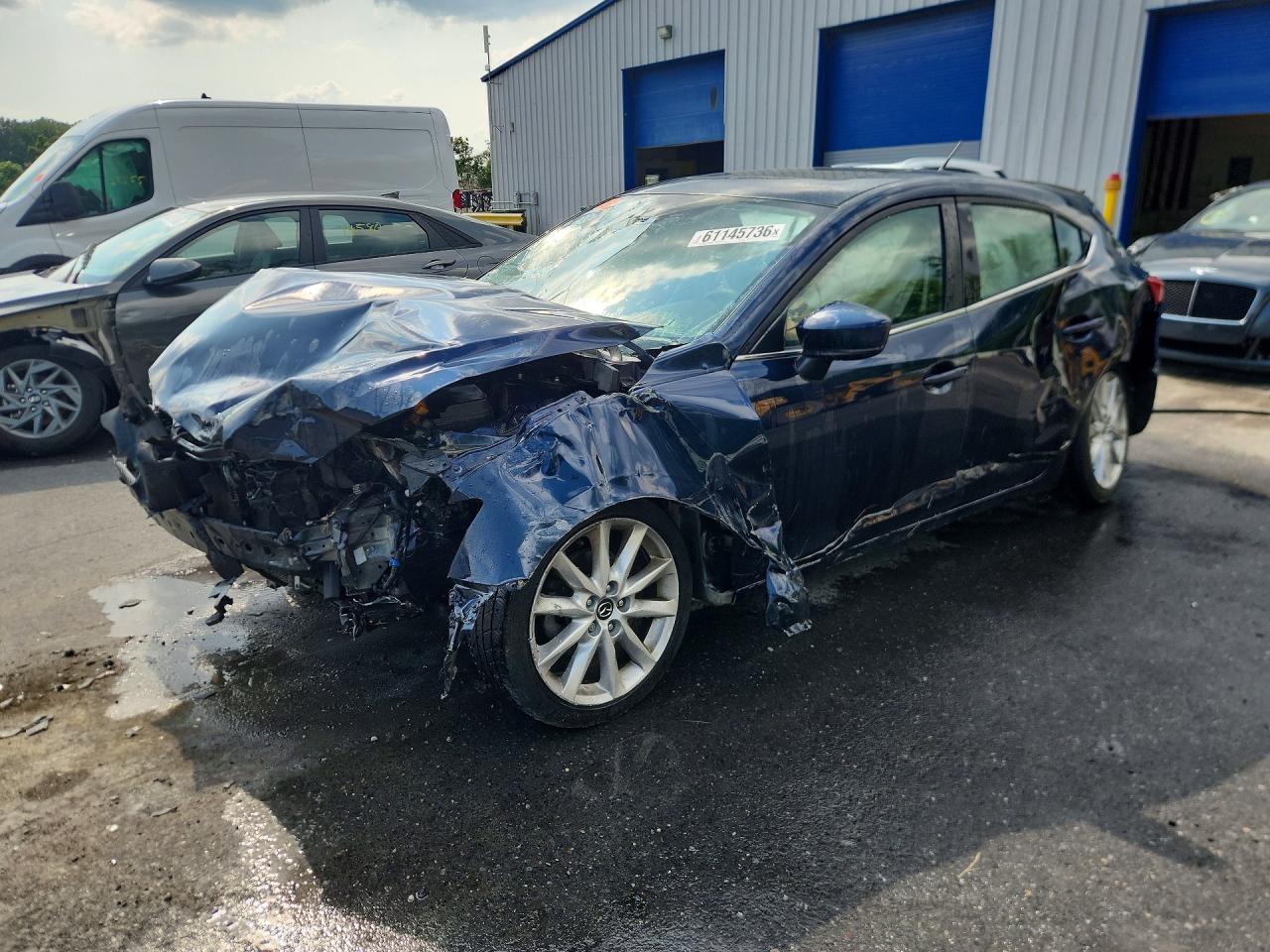 2017 MAZDA 3 Touring — Front 3/4