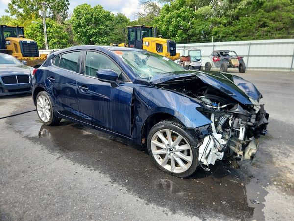 2017 MAZDA 3 Touring — Passenger 3/4