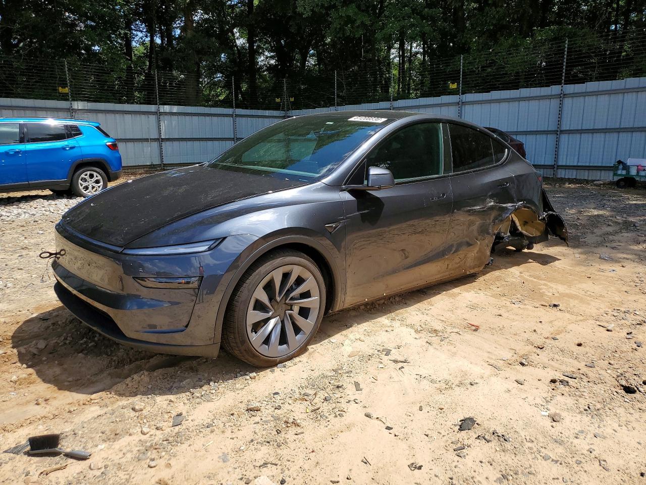 2026 TESLA MODEL Y — Front 3/4