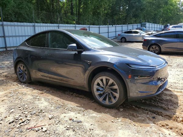 2026 TESLA MODEL Y — Passenger 3/4