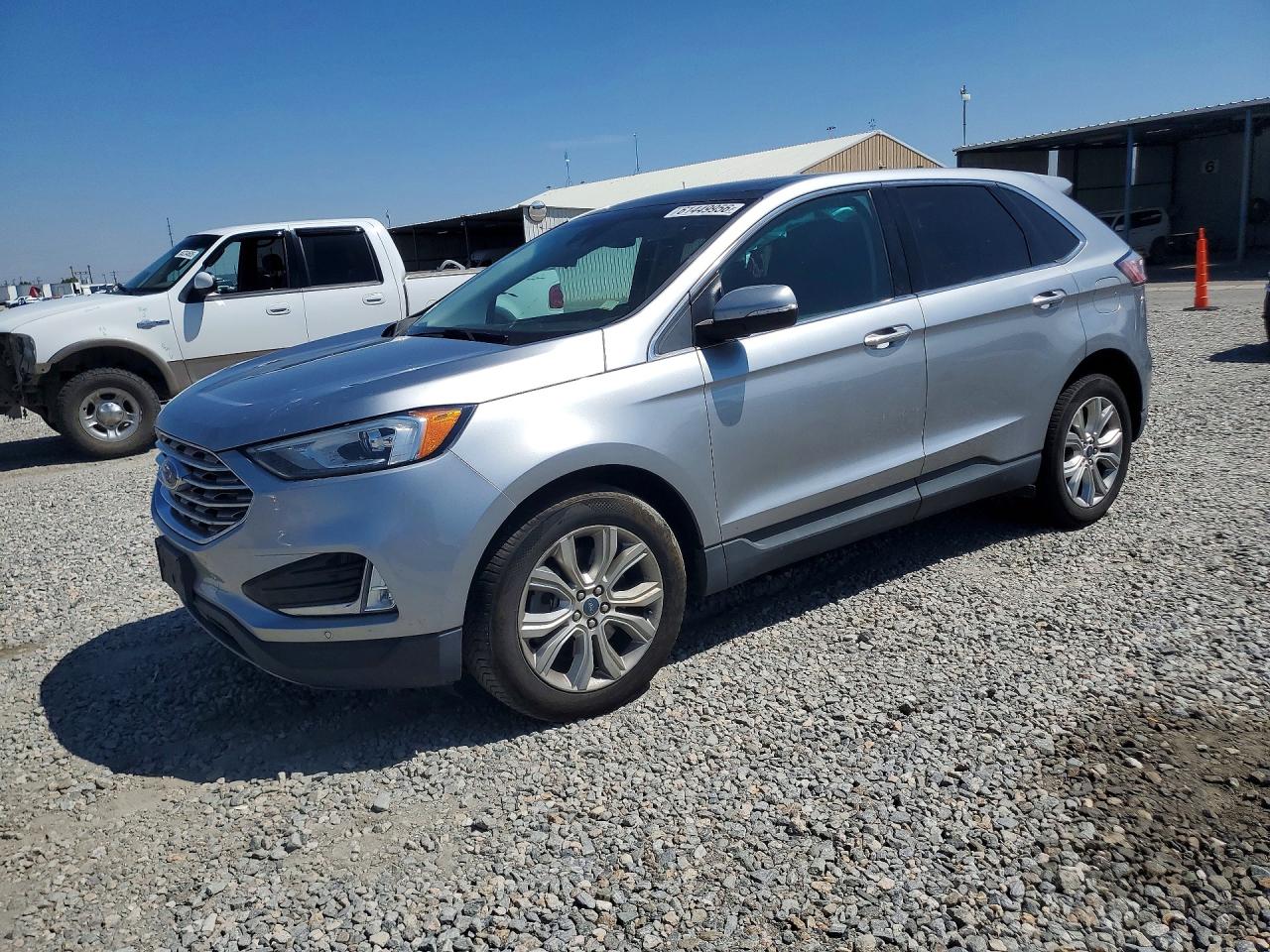 2021 FORD EDGE Titanium — Front 3/4