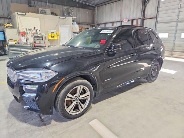 2014 BMW X5 xDrive50i — Front 3/4