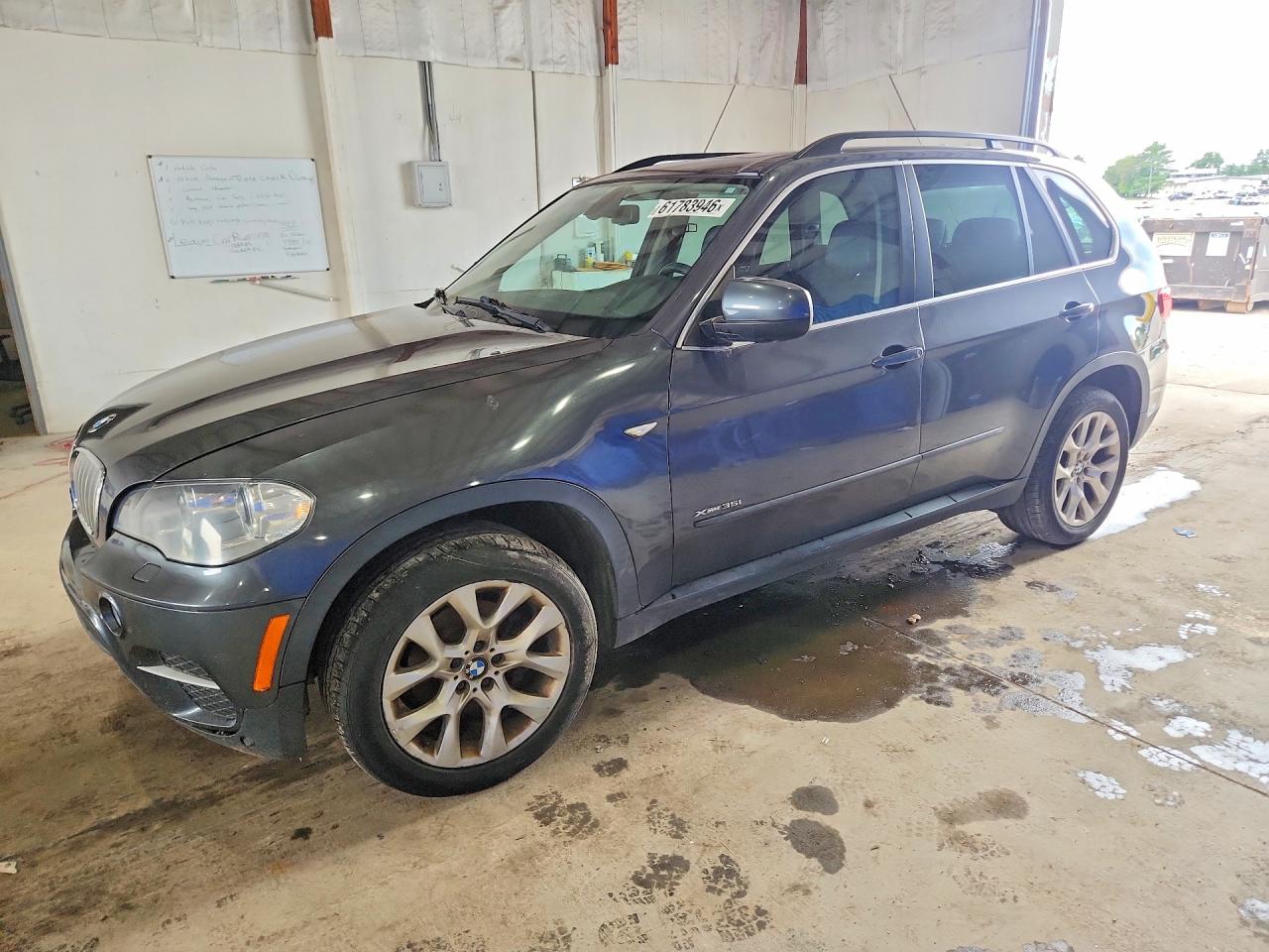 2013 BMW X5 xDrive35i — Front 3/4