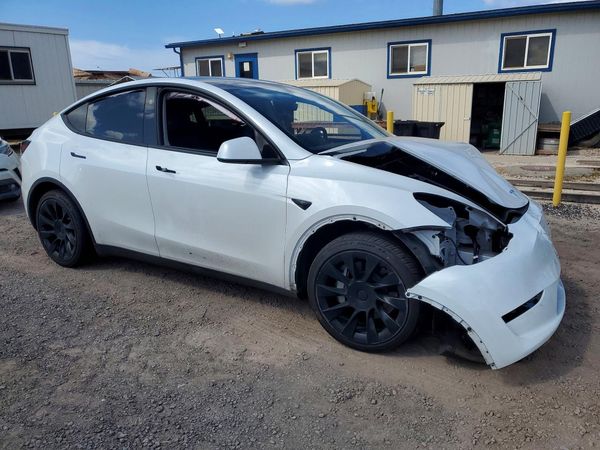 2024 TESLA MODEL Y — Passenger 3/4