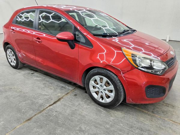 2014 KIA RIO 1.6 AT LX STD/Power — Passenger 3/4