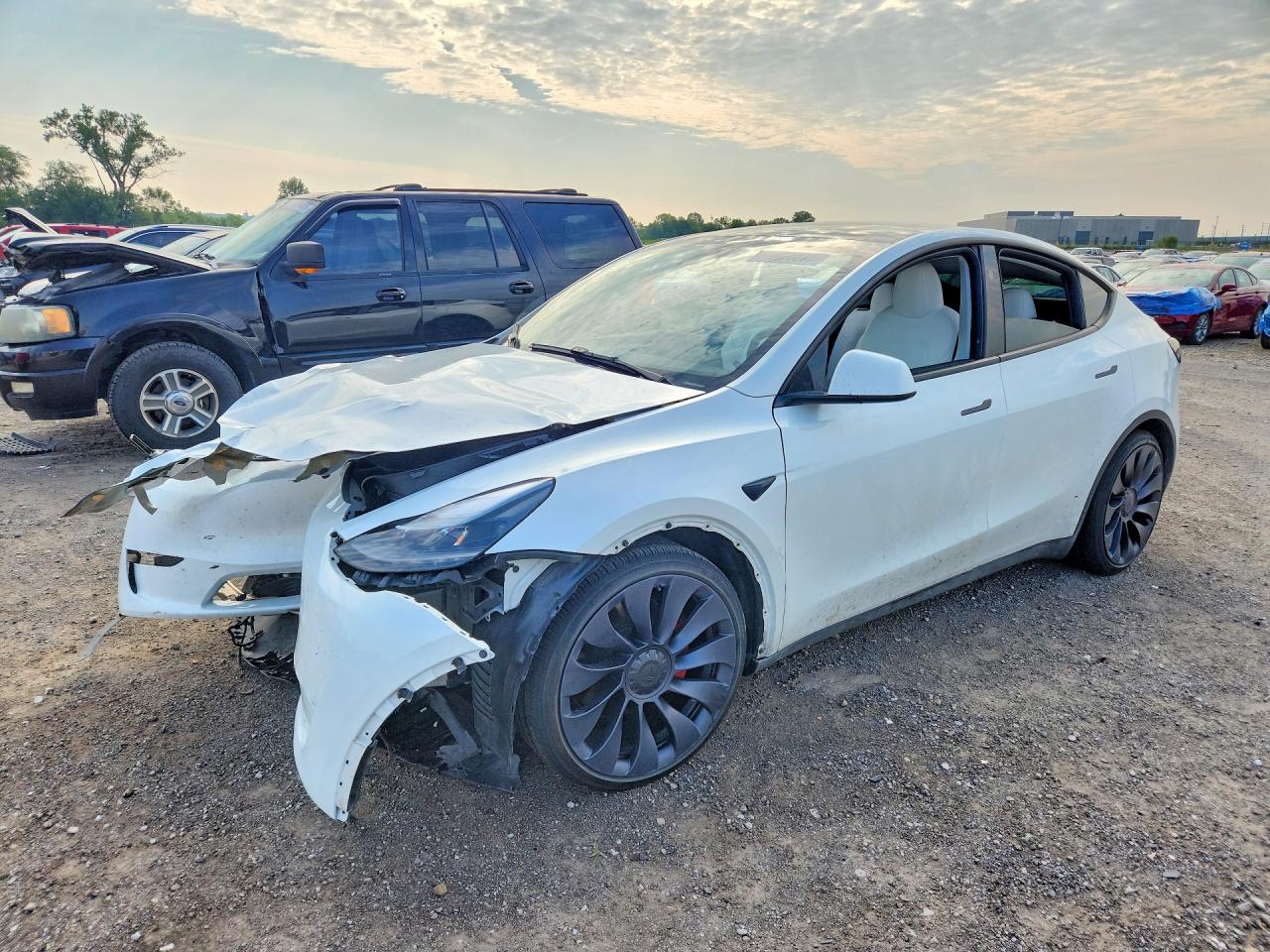 2024 TESLA MODEL Y — Front 3/4