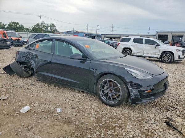 2023 TESLA MODEL 3 — Passenger 3/4