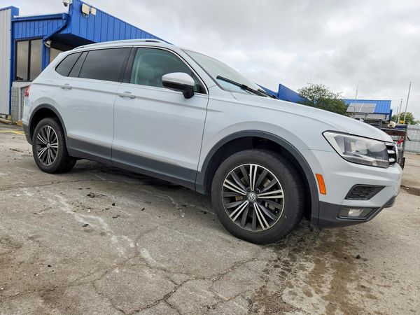 2018 VOLKSWAGEN TIGUAN SE, SEL — Passenger 3/4