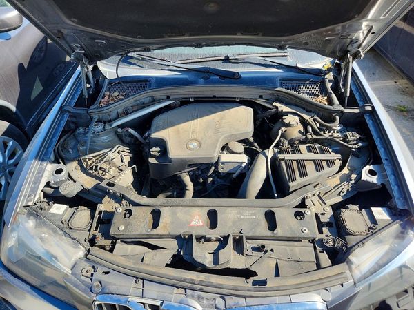 2013 BMW X3 xDrive28i — Engine bay