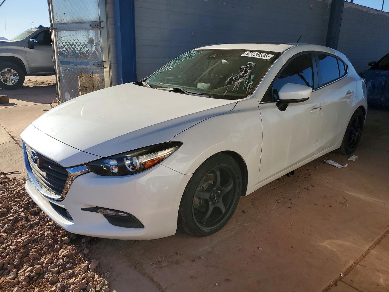 2017 MAZDA 3 — Front 3/4