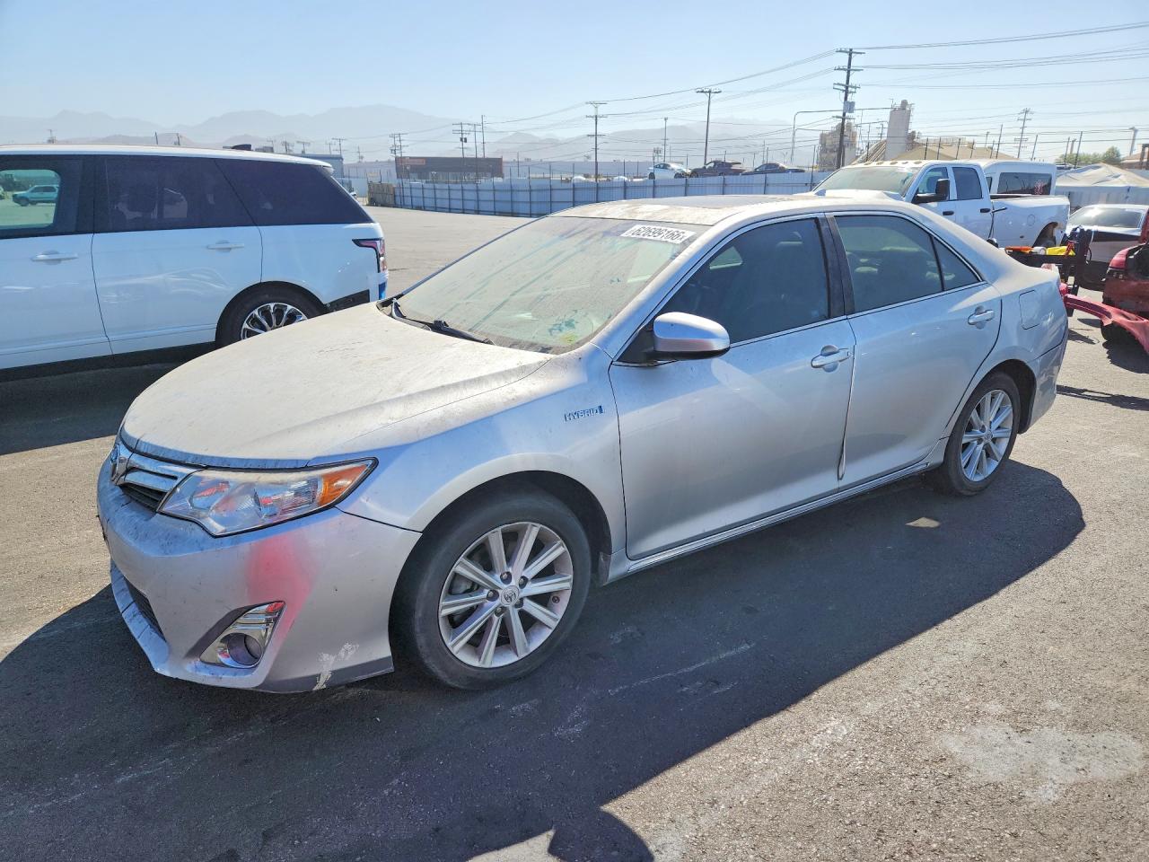 2012 TOYOTA CAMRY SOLA Hybrid — Front 3/4