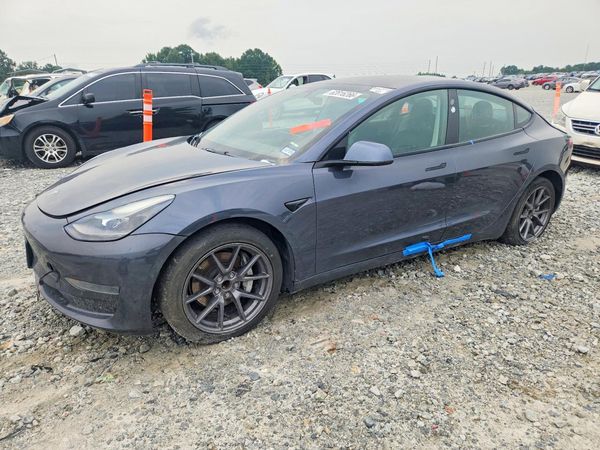 2021 TESLA MODEL 3 — Front 3/4