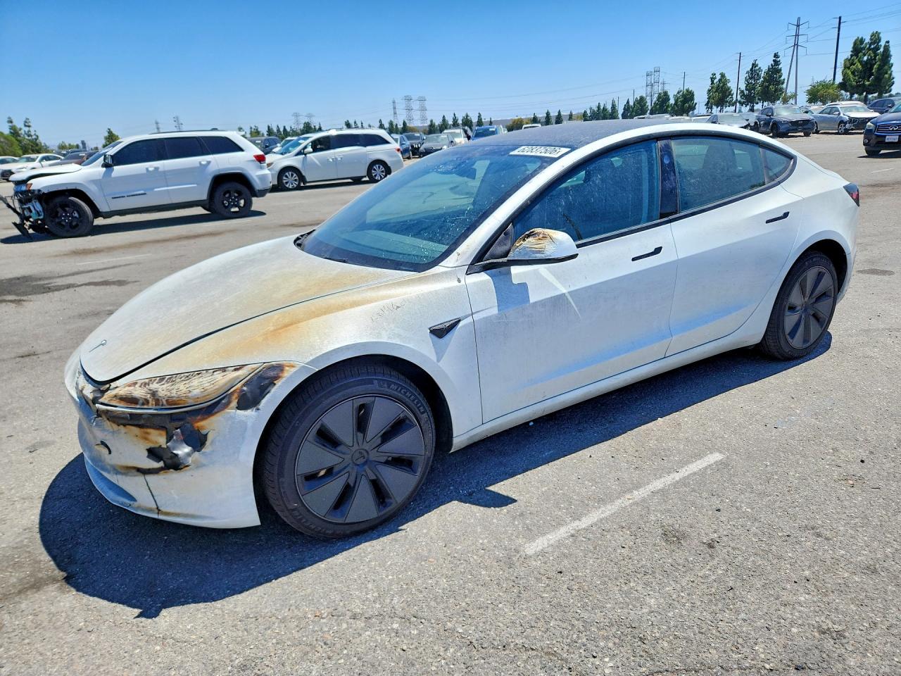 2025 TESLA MODEL 3 — Front 3/4